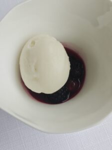 Lapsang Ice Cream with dark berries and a lavender sauce infused with oil made from blackcurrant (cassis) branches