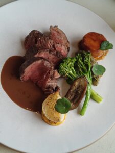 Charcoal-grilled rosemary beef tenderloin | Fondant potato – eggplant – sweet onion – garlic jus