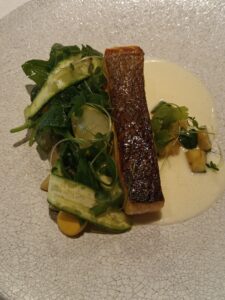 Scottish salmon zucchini, arugula, lemon beurre blanc