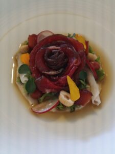Cured venison, chestnut, plum, hazelnut, porcini mushroom essence