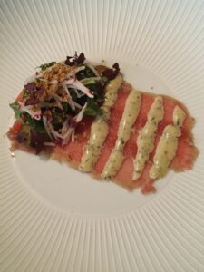 Cured beef entrecôte with honey-dill mustard sauce and cucumber