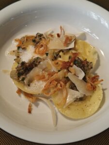 Fresh cheese ravioli with herbs